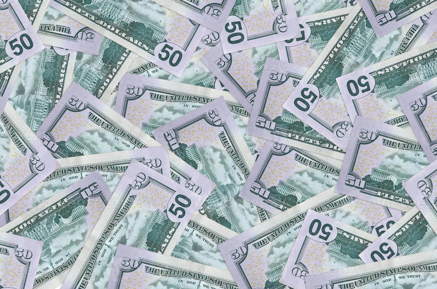 50 US dollars bills lies in big pile. Rich life conceptual background photo