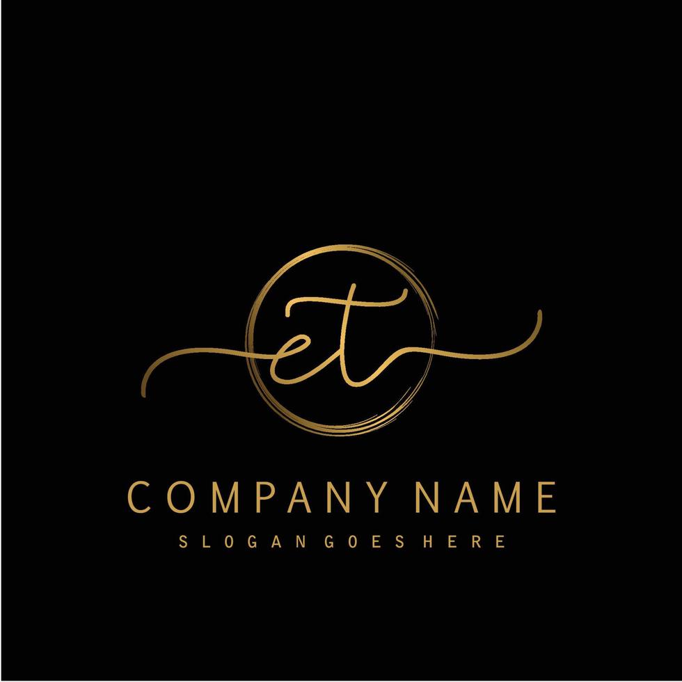 Initial ET handwriting logo with circle hand drawn vector