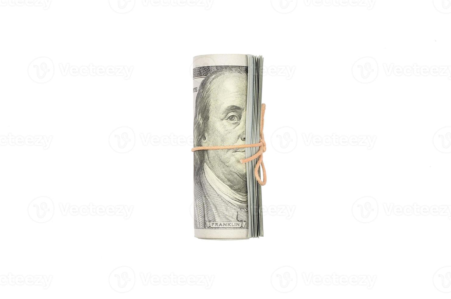 US dollars rolled up and tightened with band isolated on white background photo