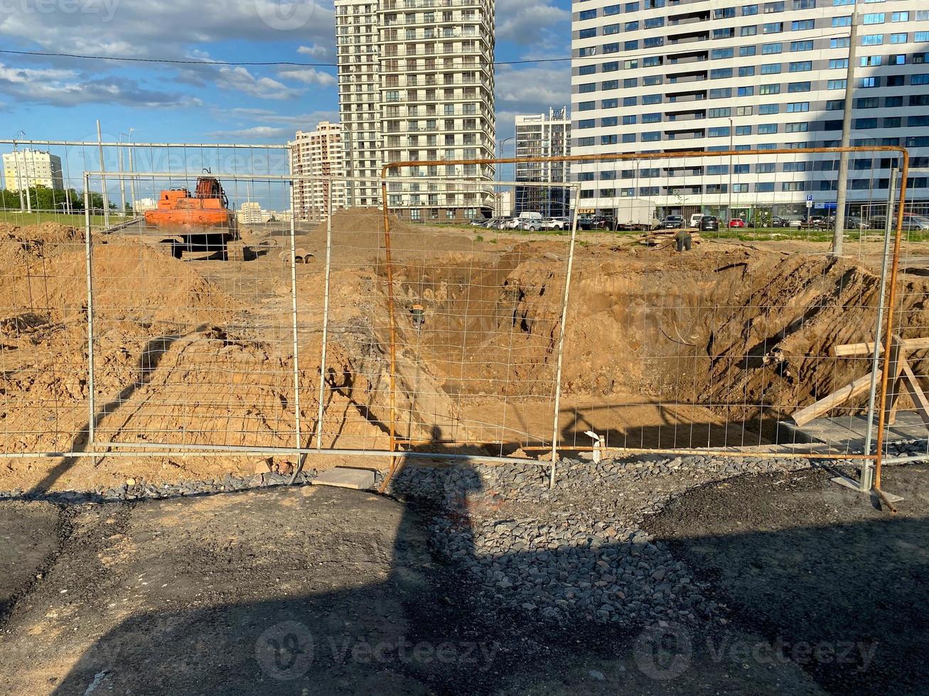 Excavation excavated road during repair and construction using construction equipment and excavators photo