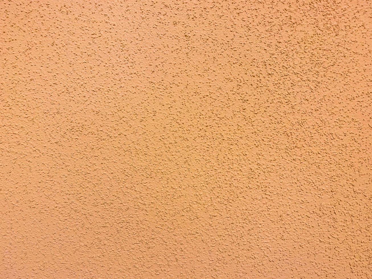 yellow color texture. applying paint to the background, volumetric 3d texture. background from beige paint. points of material create droplets. unusual color photo