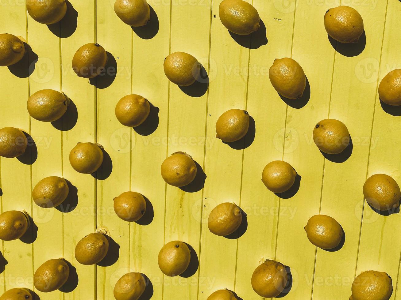 Yellow lemons for cooking citrus curd yellow background top view space for text photo