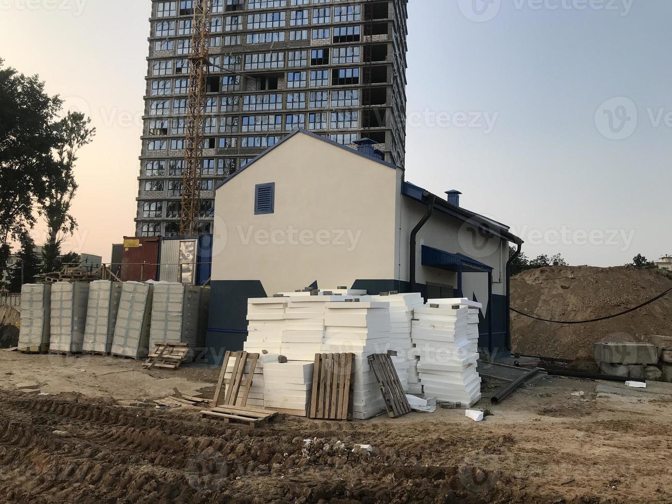 construction of a new microdistrict in the city center. tall concrete