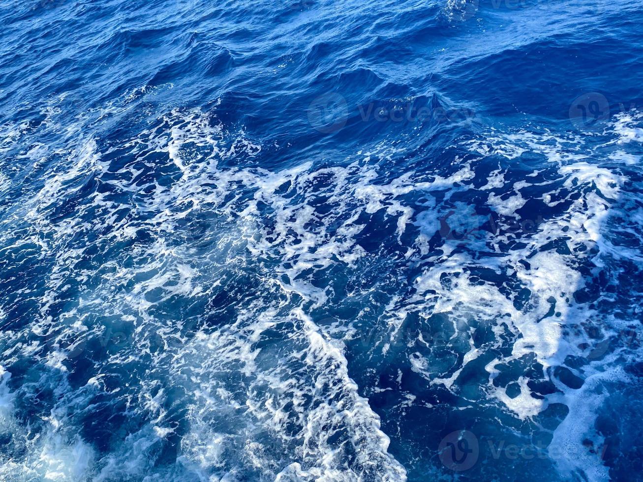 Background shot of aqua sea water surface photo