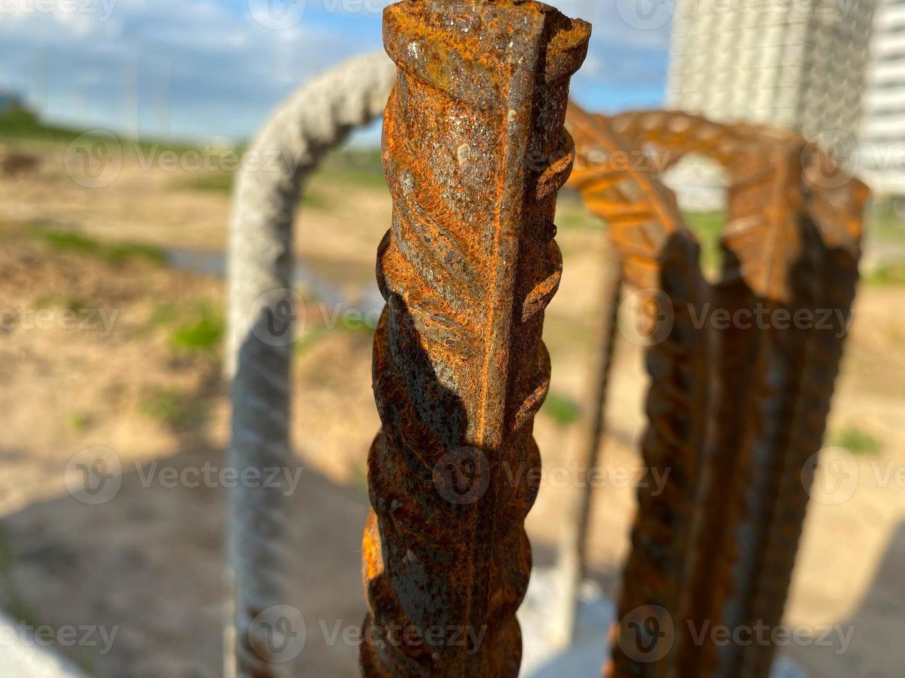 Iron metal rusty reinforcement in concrete and industrial reinforced concrete slabs used in the construction of buildings and structures photo