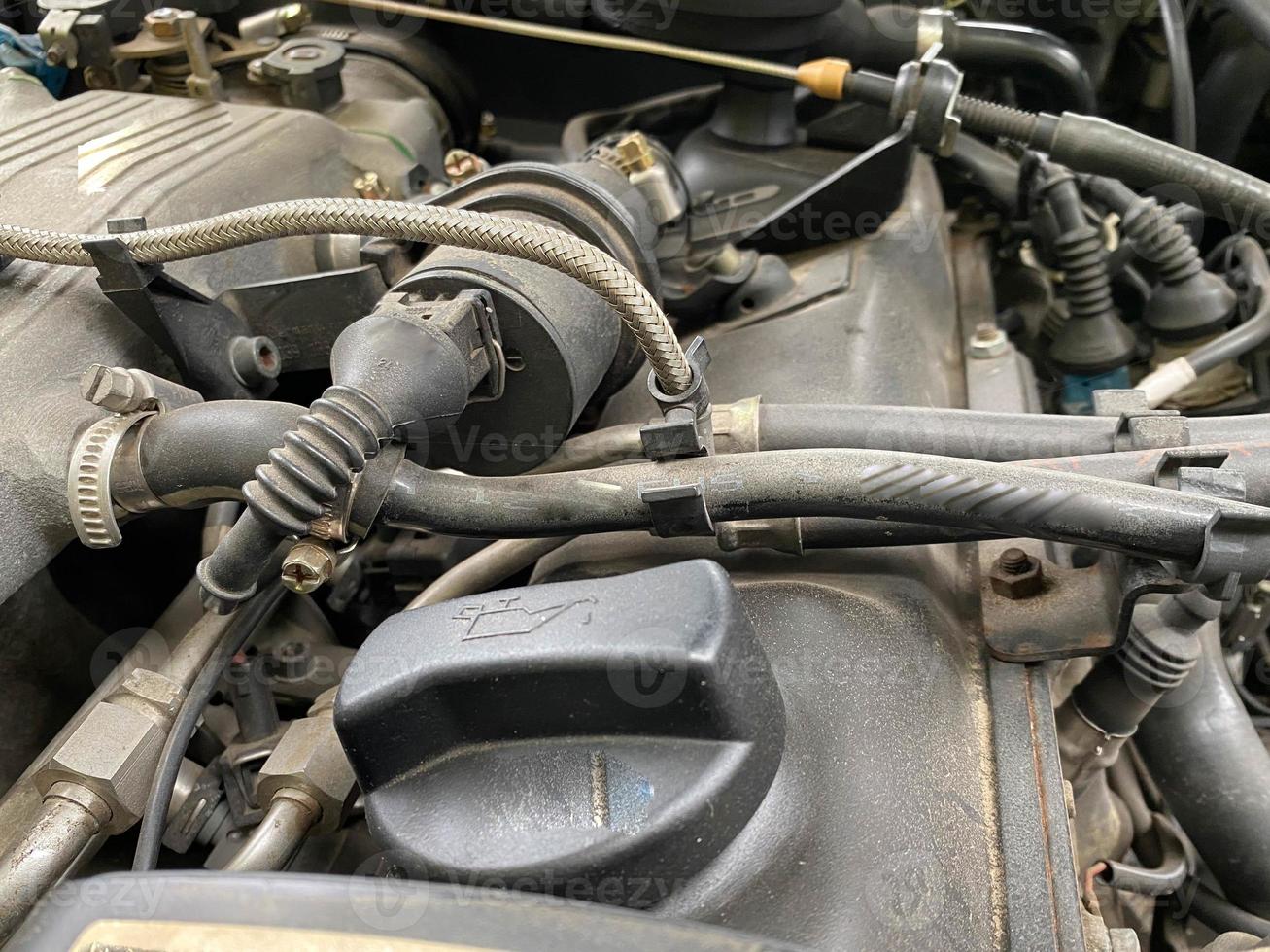 Top view of used engine and auto parts. Bad car maintenance concept photo