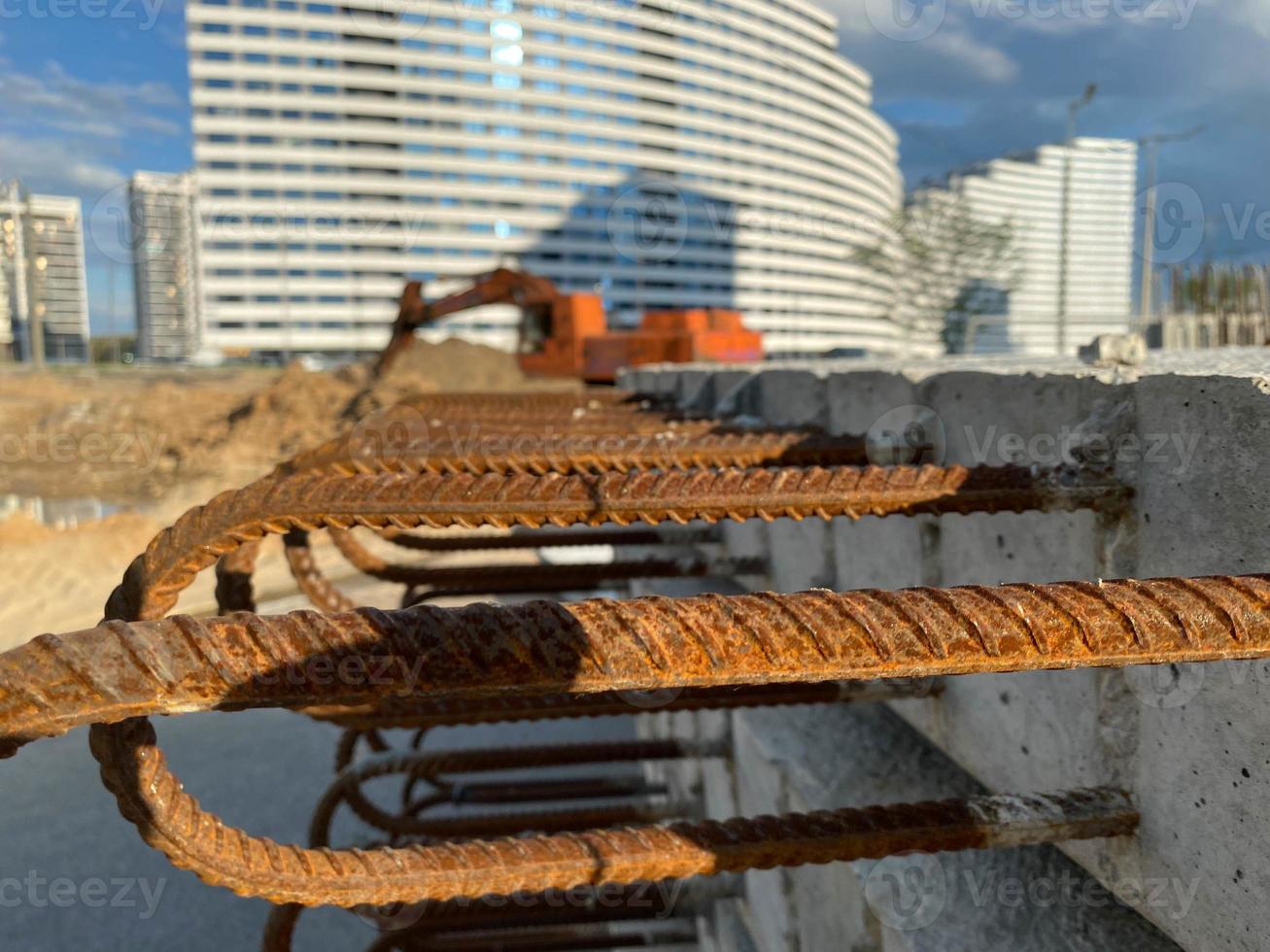 Iron metal rusty reinforcement in concrete and industrial reinforced concrete slabs used in the construction of buildings and structures photo