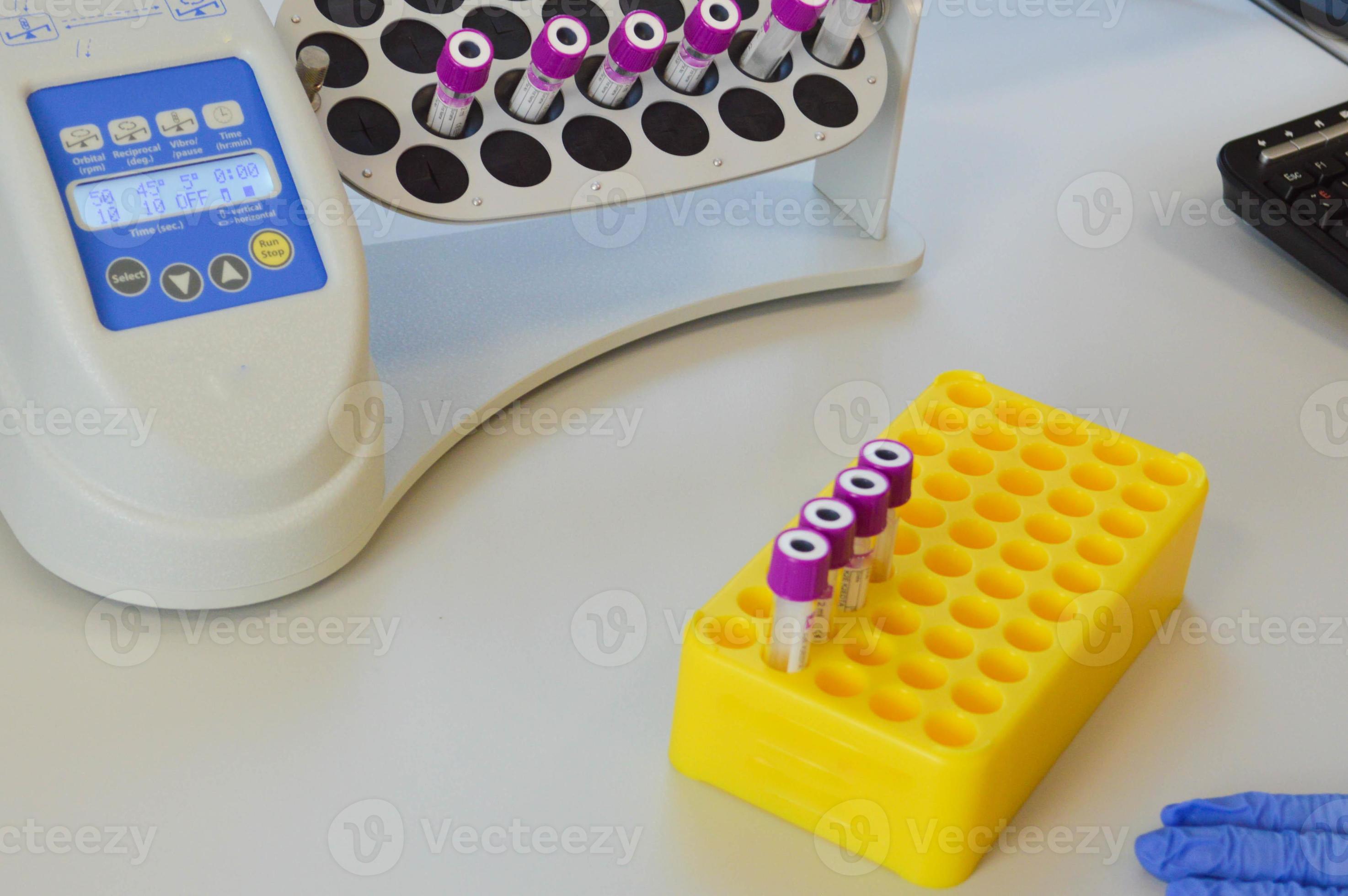 centrifugation and pipetting of test tubes with blood. performance of