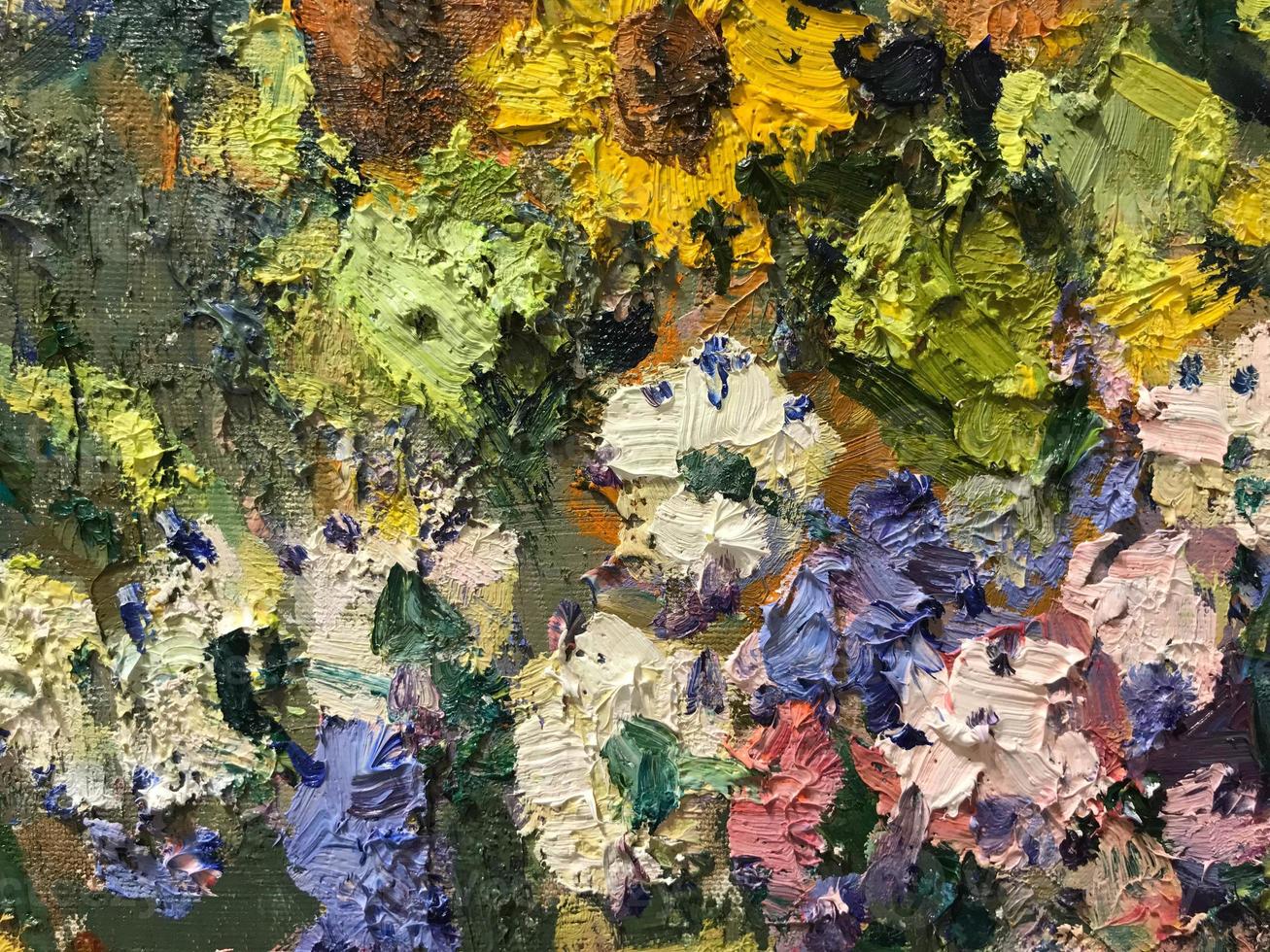 Close-up Textured background of multi-layer flaking paint on the wall. Mixing different colors of paints in the cleaved layers on the surface. Grunge texture with a deep pattern photo