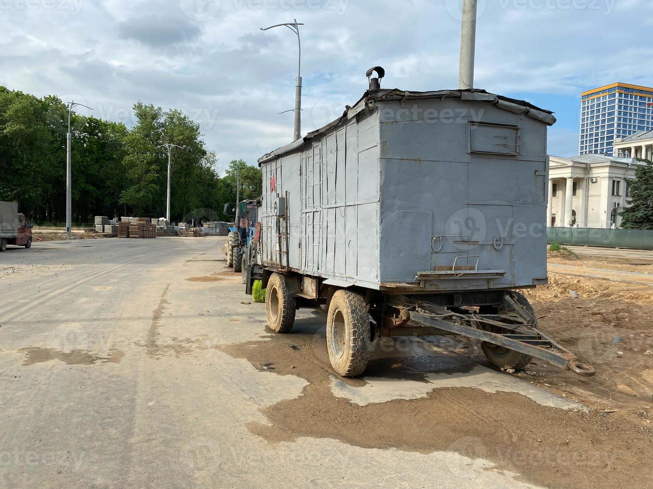 Large construction industrial mobile wagon, trailer for construction workers life at construction site photo