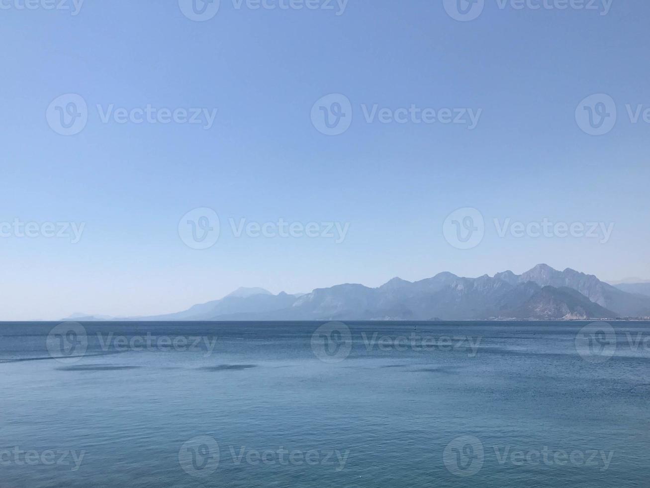 Sea aerial view,Top view,amazing nature background.The color of the water and beautifully bright.Azure beach with rocky mountains and clear water of Thailand ocean at sunny day photo