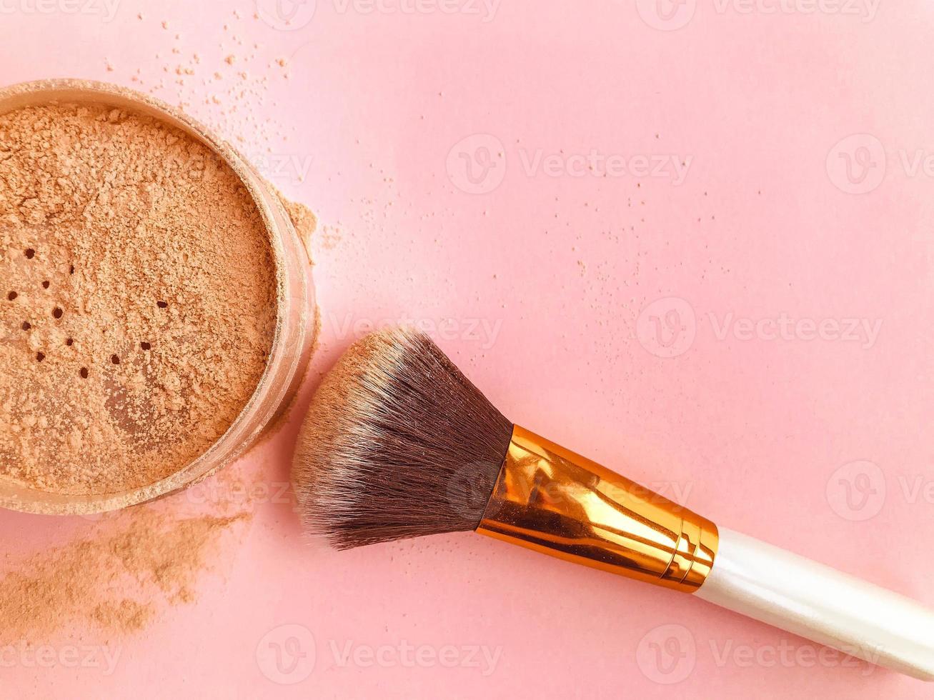 loose powder on a pink background. remedy for oily skin. toning of the face, pores, acne. creating a matte finish. face beauty photo