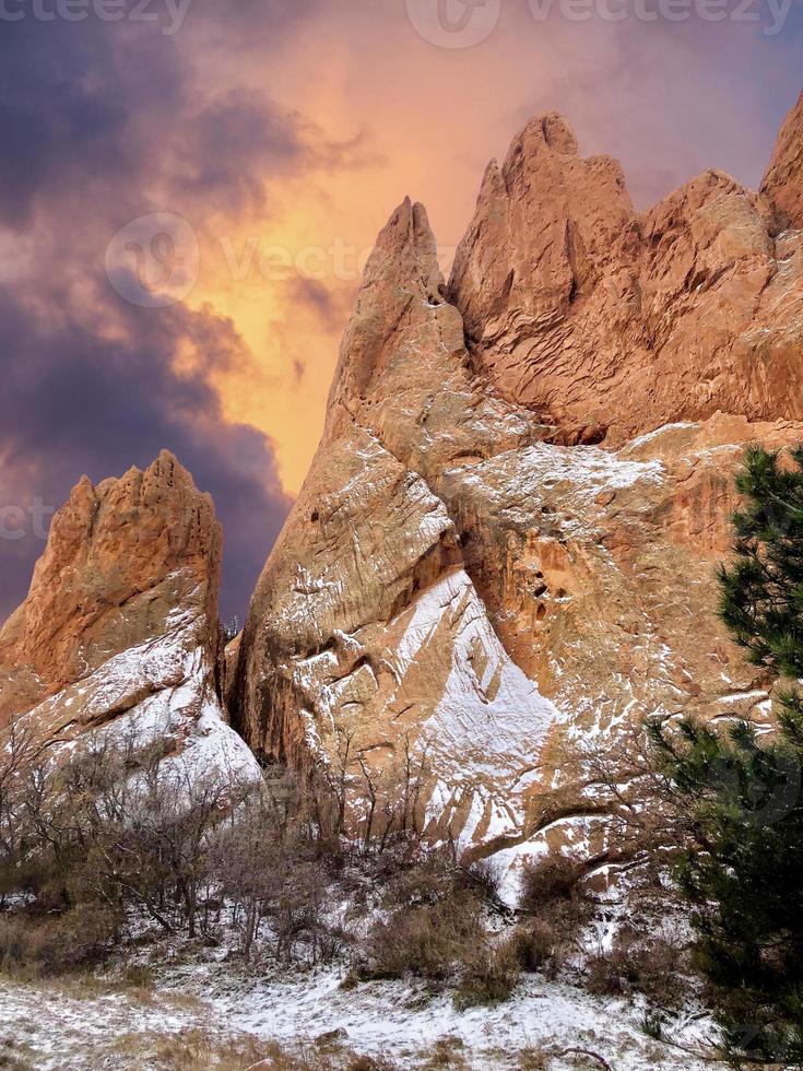 Garden of the Gods during a snow storm with beautiful contrasting white snow against the red rocks. photo