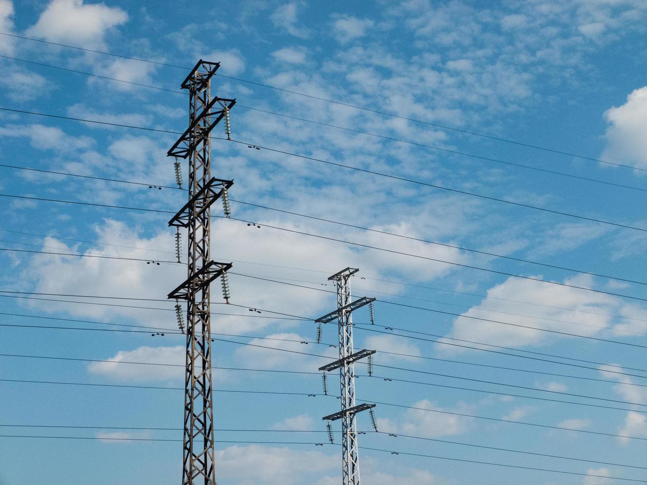 Two high-voltage transmission towers. photo