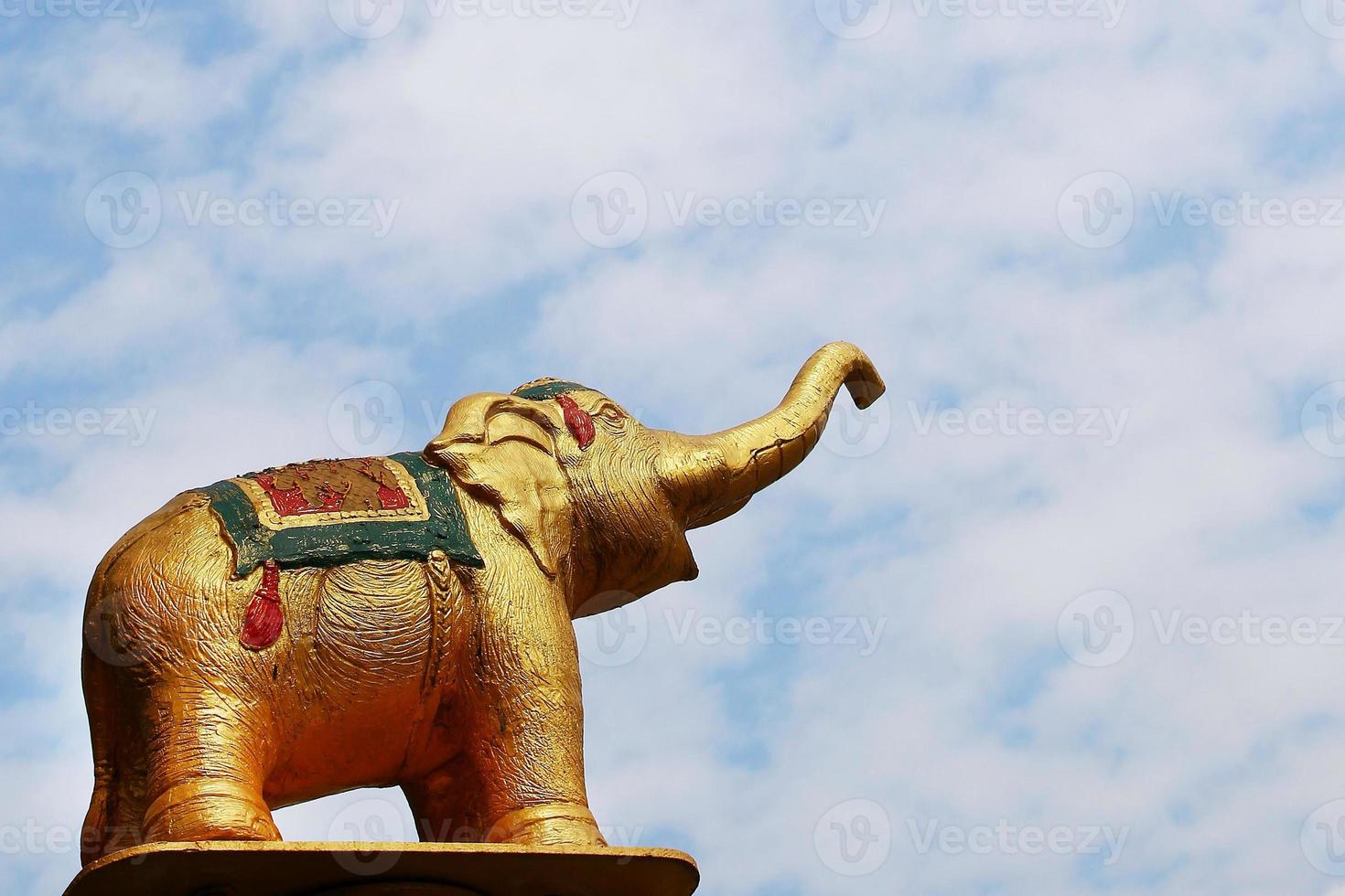 Statue of elephant on a background of blue sky. Chiang Mai, Thailand. photo