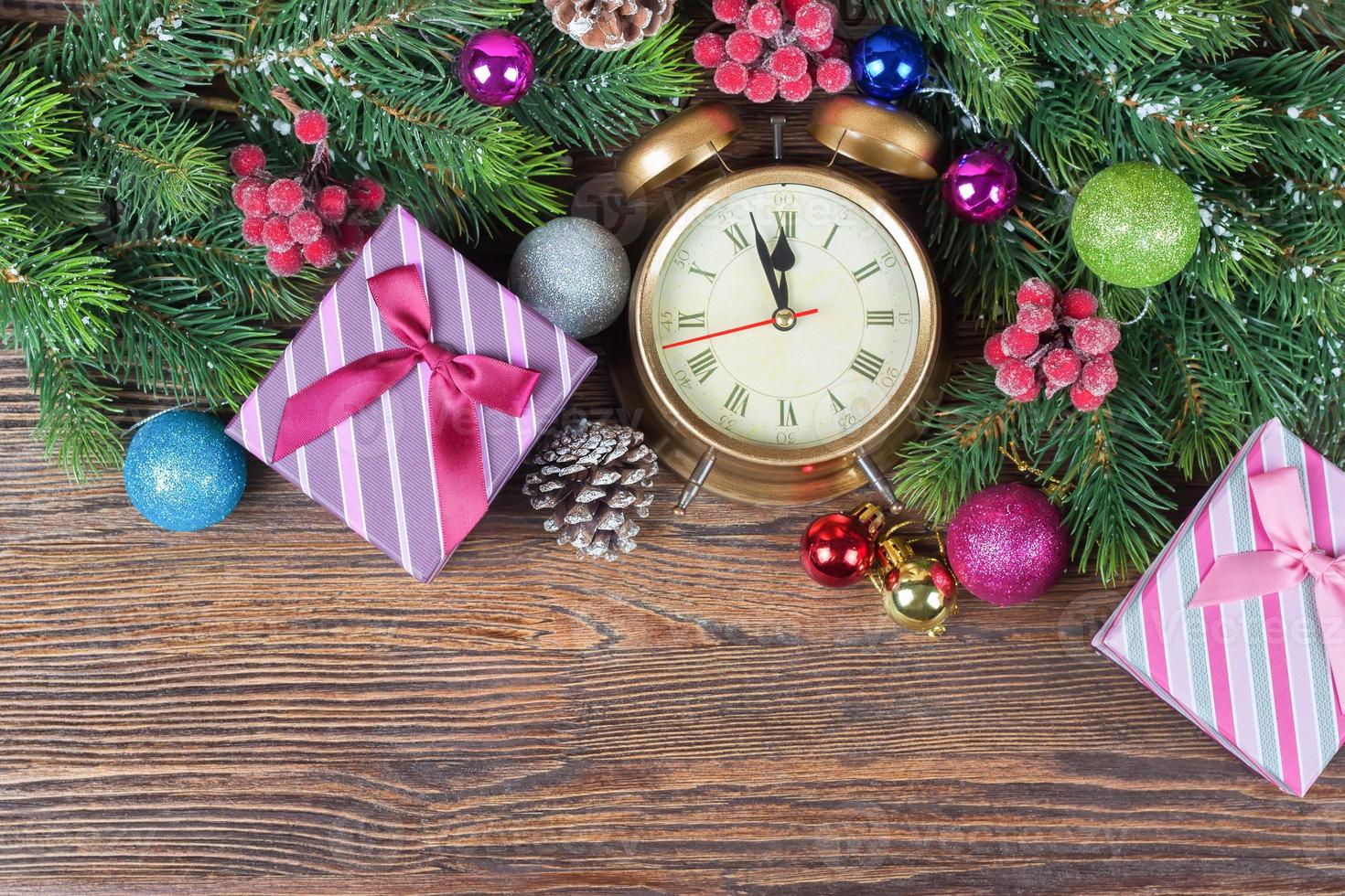 Christmas fir tree with decoration wooden background photo