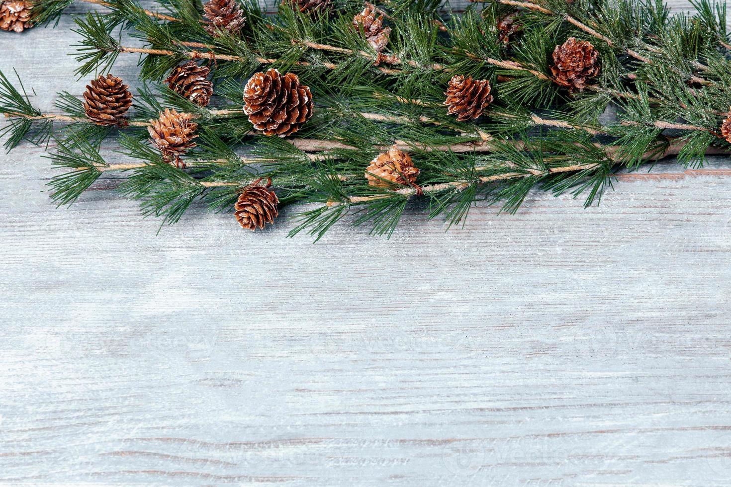 New Year or New Year's Eve background with fir branch with cones. The year 2023 is coming. photo