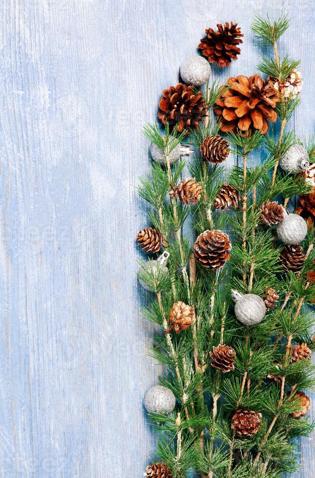 New Year or New Year's Eve background with fir branch with cones. The year 2023 is coming. photo