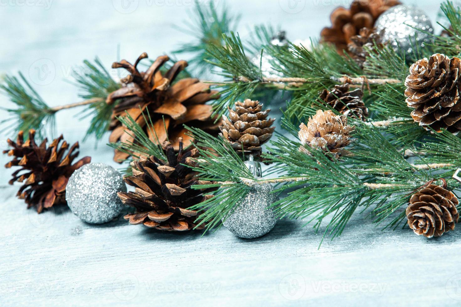 New Year or New Year's Eve background with fir branch with cones. The year 2023 is coming. photo