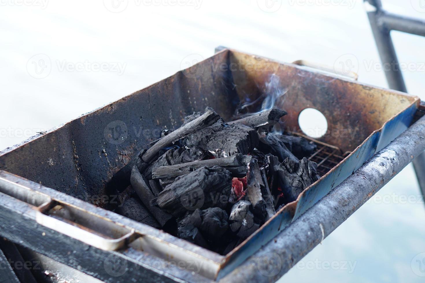 The grill used the oil tank cut in half. photo