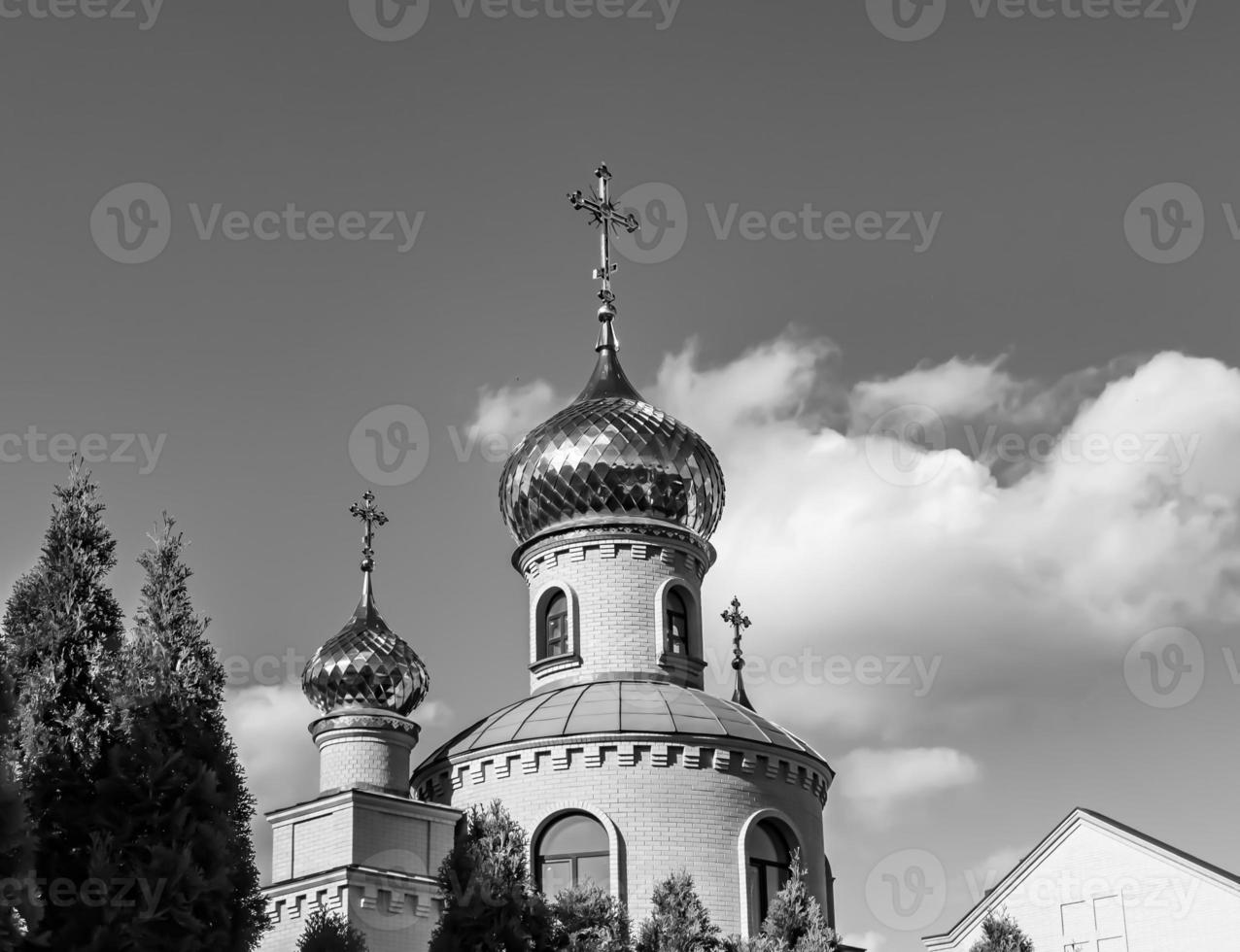 Christian church cross in high steeple tower for prayer photo