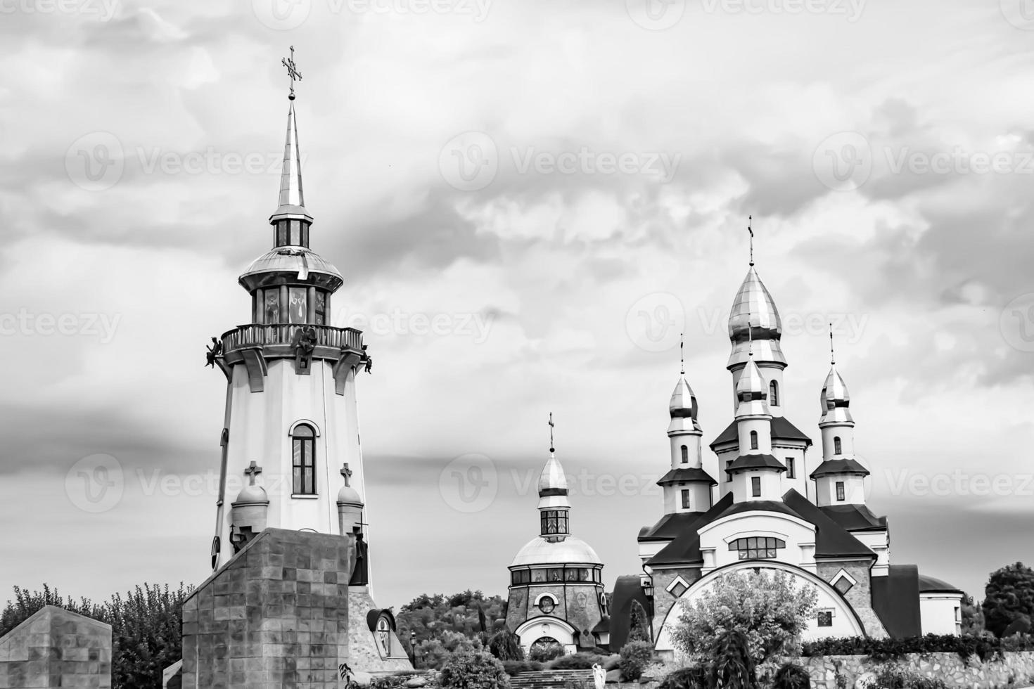 Christian church cross in high steeple tower for prayer photo