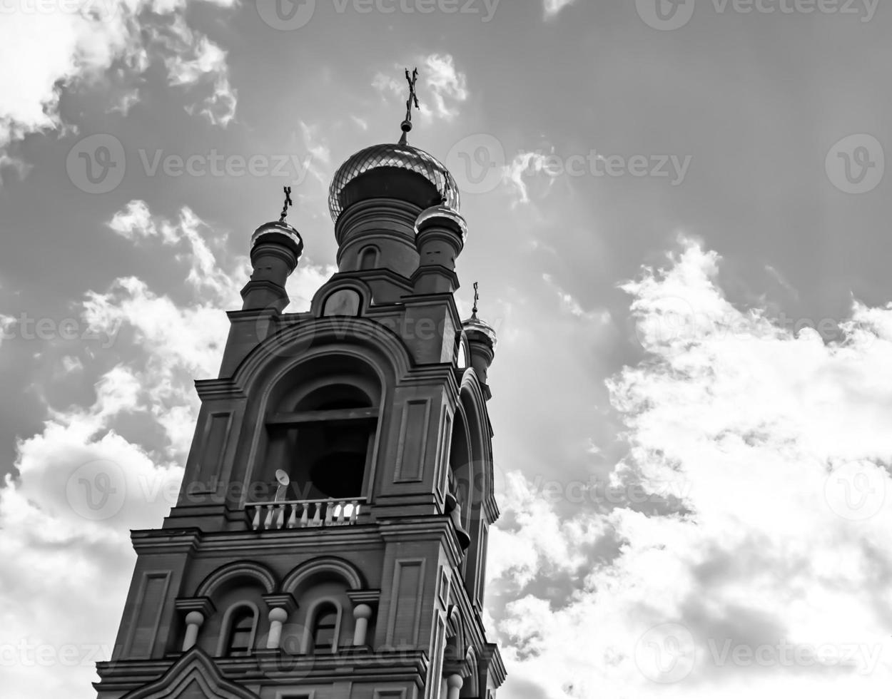 Christian church cross in high steeple tower for prayer photo