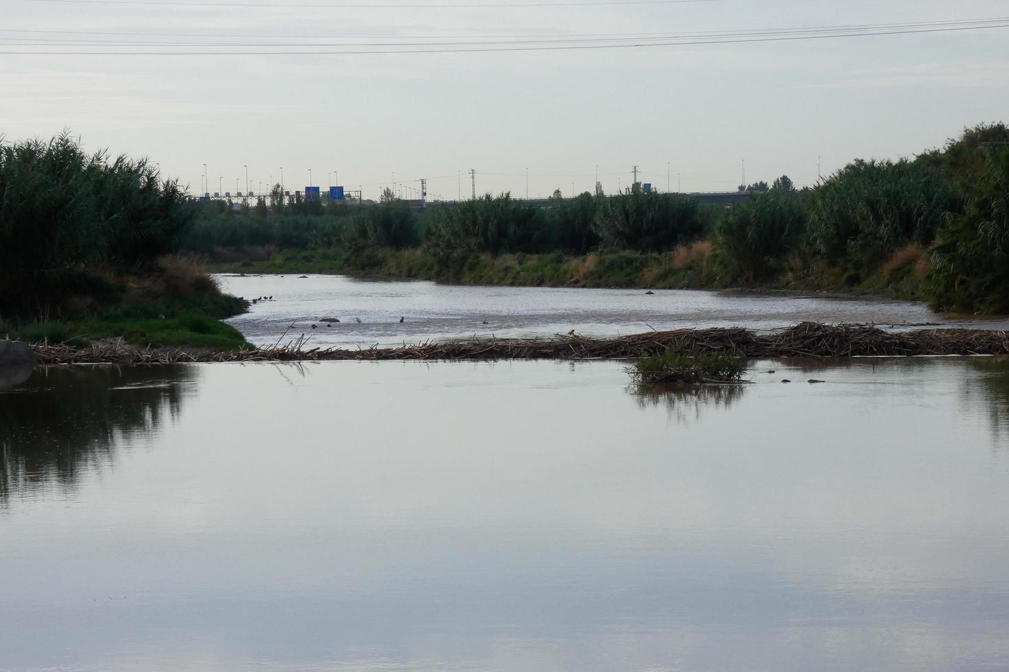 Llobregat river and adjacent roads in the Baix Llobregat region very close to the city of Barcelona. photo