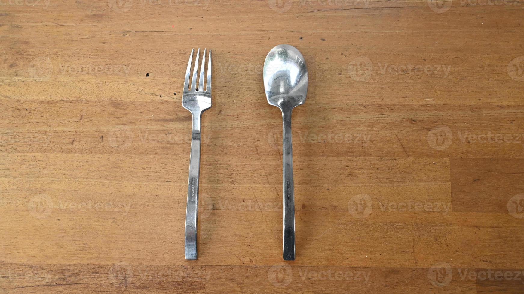 chrome spoon and fork on a white background photo