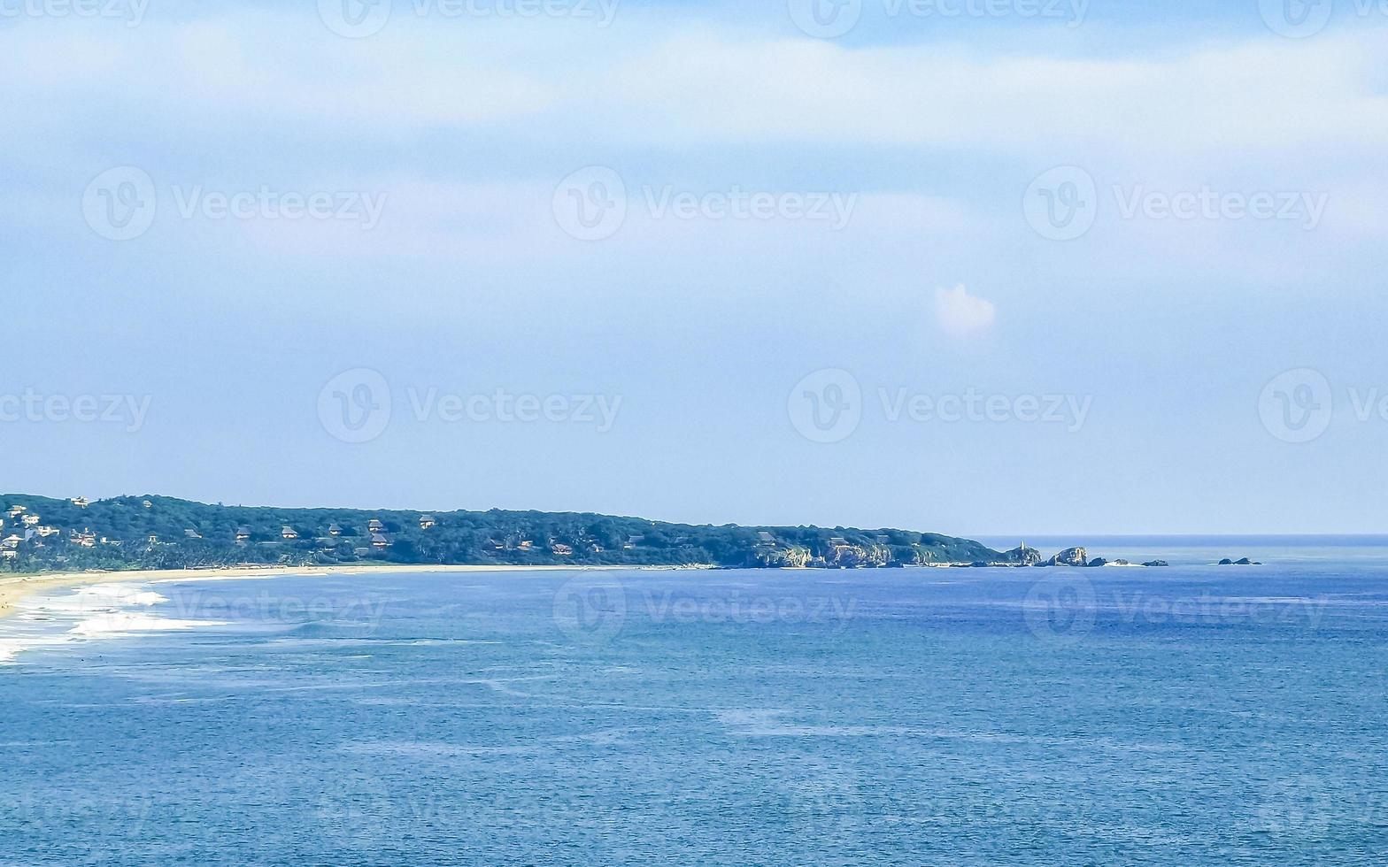 Beautiful natural panorama seascape palm trees beach Puerto Escondido Mexico. photo