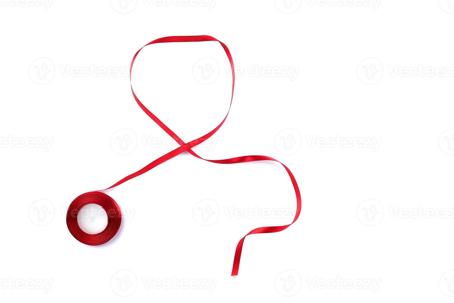 Red Support Ribbon isolated on white background. World aids day and national HIV AIDS and aging awareness month with red ribbon. copyspace area photo