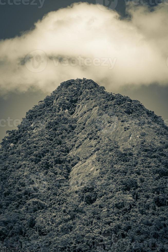 Abraao mountain Pico do Papagaio with clouds. Ilha Grande Brazil. photo