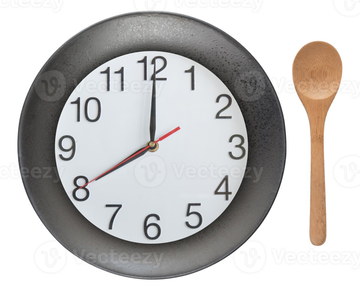 Clock on the plate and wooden spoon isolated 15123635 PNG
