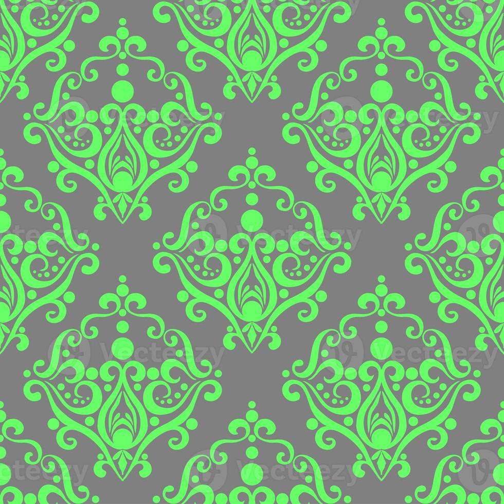 symmetrical seamless ornament tile from green graphic abstract elements on a gray background, texture, design photo