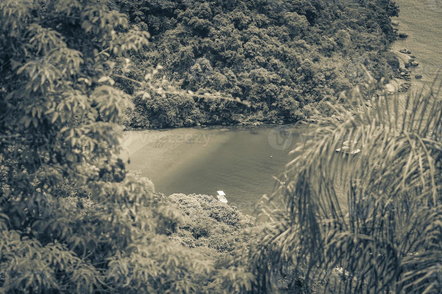 Green lagoon on Ilha Grande Abraao beach panorama Brazil. photo