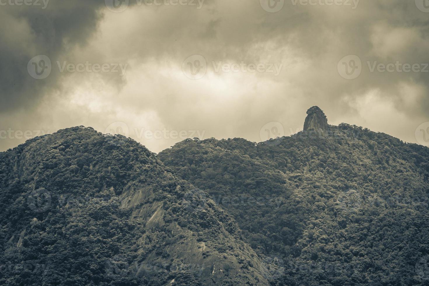 Abraao mountain Pico do Papagaio with clouds Ilha Grande Brazil. photo