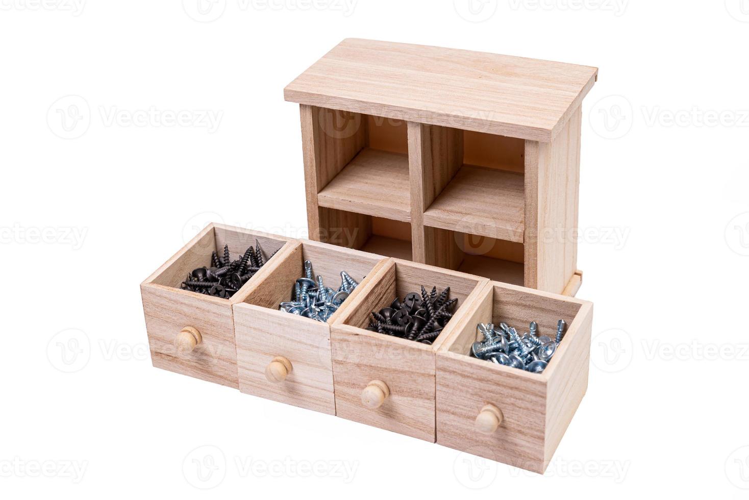 Wooden box for metal bolts, screws and nuts close up, metal self-tapping screws made of steel, self-tapping screw for metal, for iron, chrome-plated self-tapping screw, photo