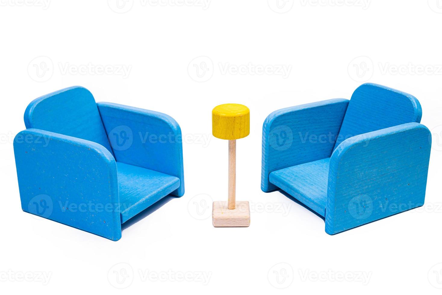 a wooden blue toy chair, a sofa, two chairs with a table, a yellow table, blue upholstered wooden chairs. yellow lamp on isolated white background photo