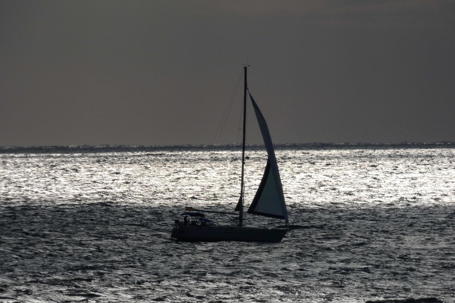 Sailboat sailing in the mediterranean sea, calm waters photo