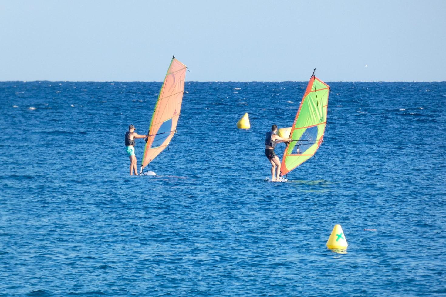 practicing windsurfing in the mediterranean sea, calm sea photo