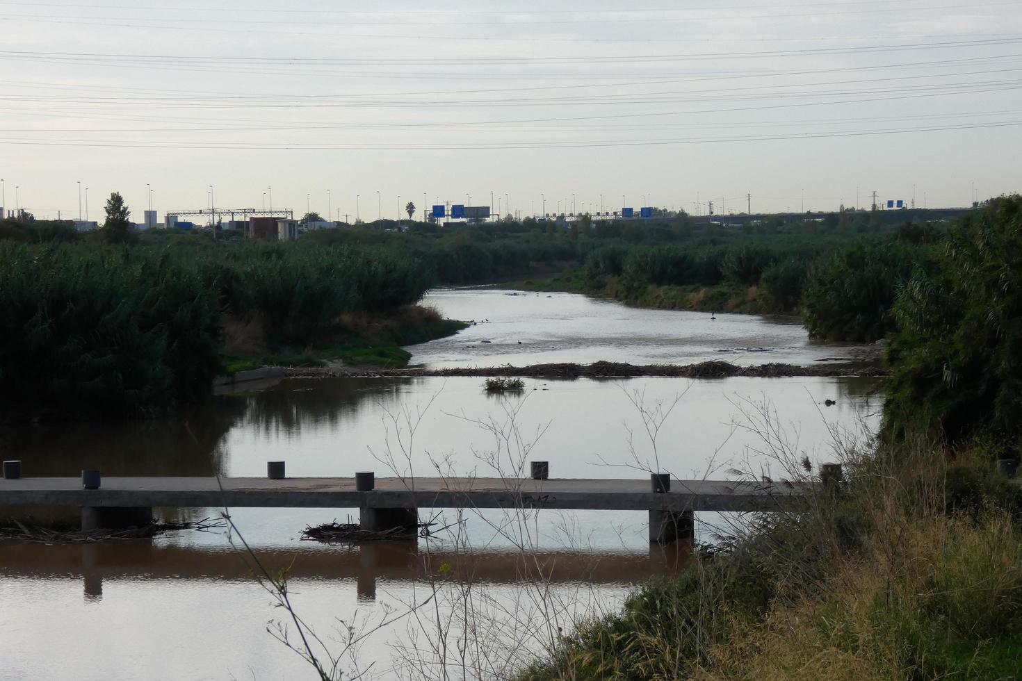 Llobregat river and adjacent roads in the Baix Llobregat region very close to the city of Barcelona. photo