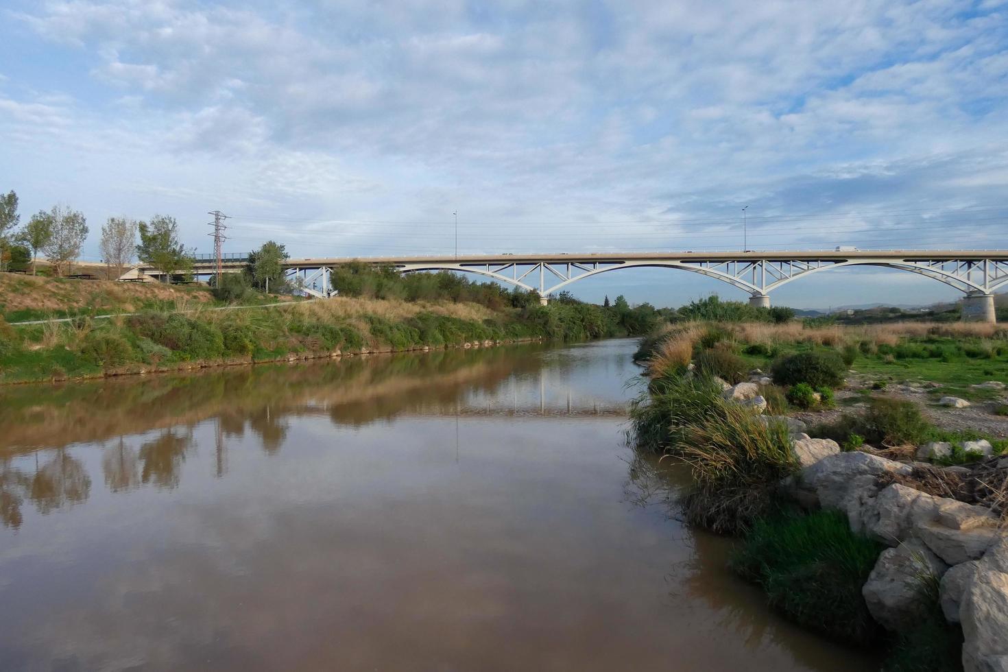 Llobregat river and adjacent roads in the Baix Llobregat region very close to the city of Barcelona. photo