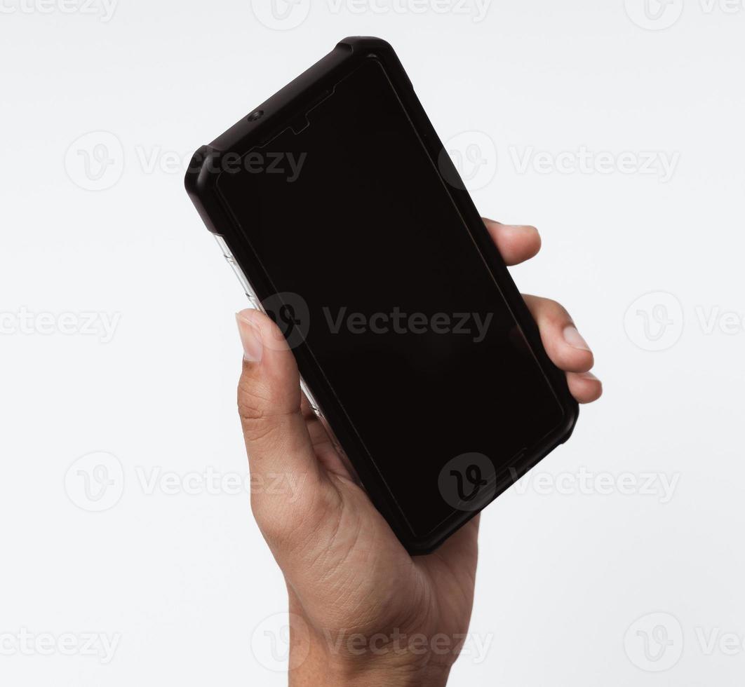 African-american person holding a mobile smartphone. Concept of black people. photo