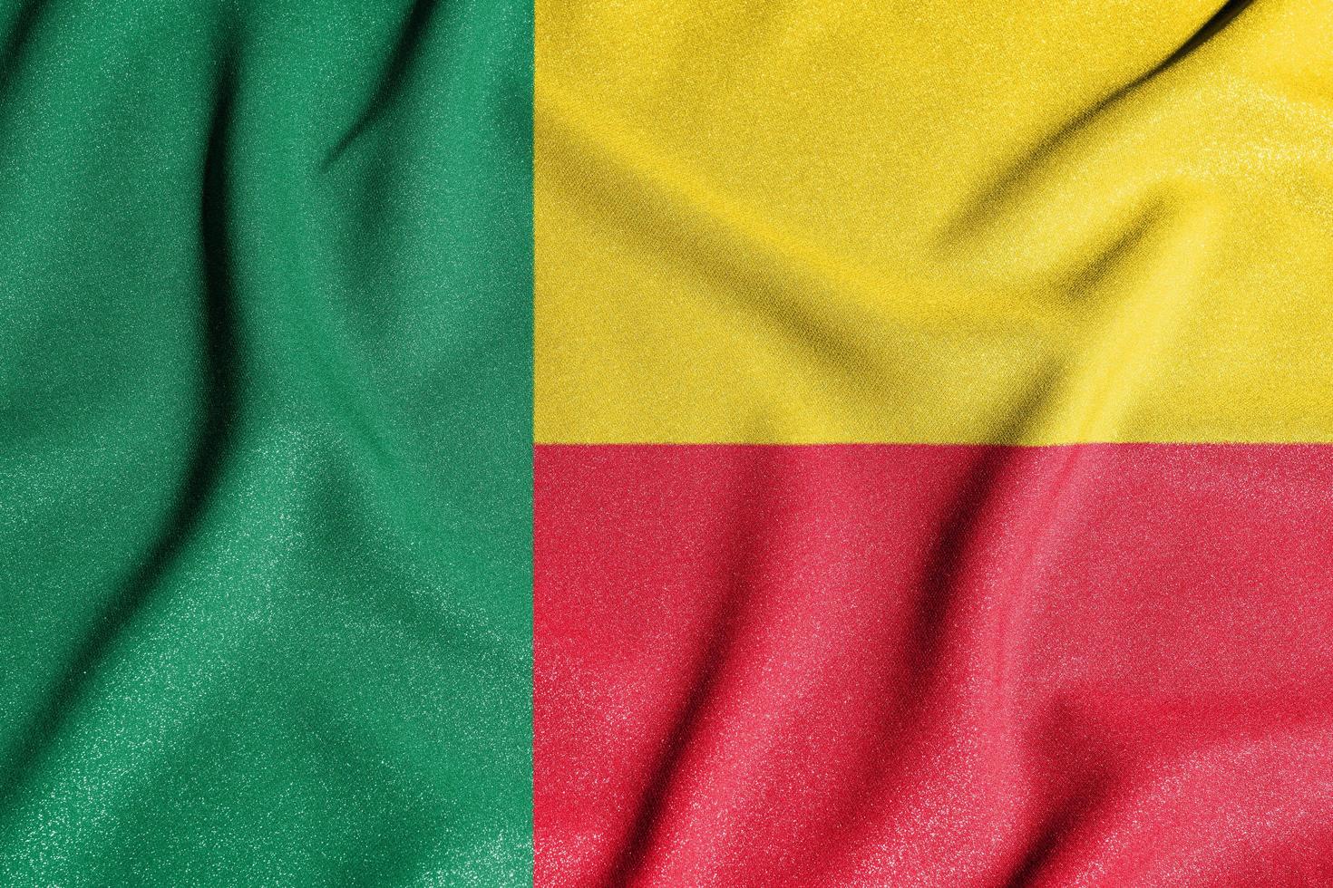National flag of the Republique du Benin. The main symbol of an independent country. An attribute of the large size of a democratic state. photo