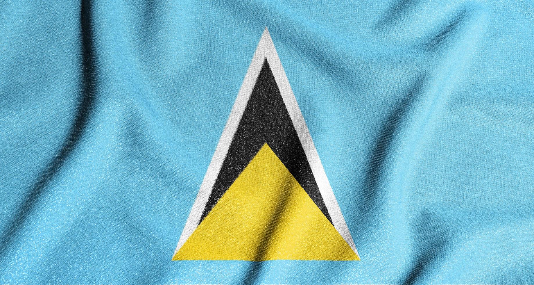 National flag of the Saint Lucia. The main symbol of an independent country. Flag of Saint Lucia. photo