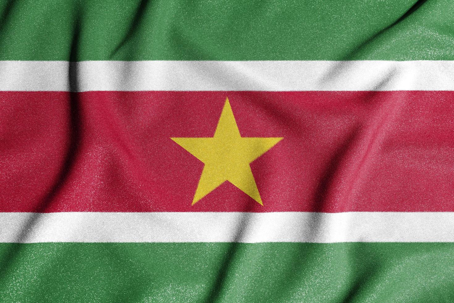 National flag of the Suriname. The main symbol of an independent country. Flag of Suriname. An attribute of the large size of a democratic state. photo