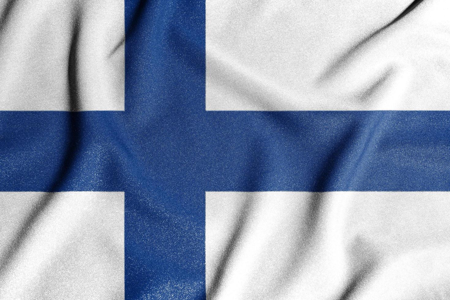 National flag of the Finland. The main symbol of an independent country. Flag of Finland. An attribute of the large size of a democratic state. photo