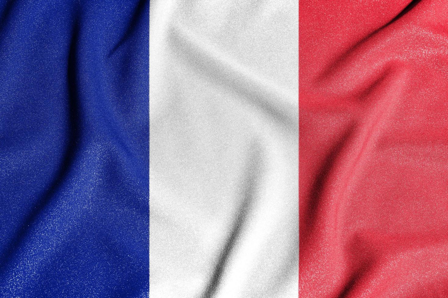 National flag of the France. The main symbol of an independent country. Flag of France. An attribute of the large size of a democratic state. photo
