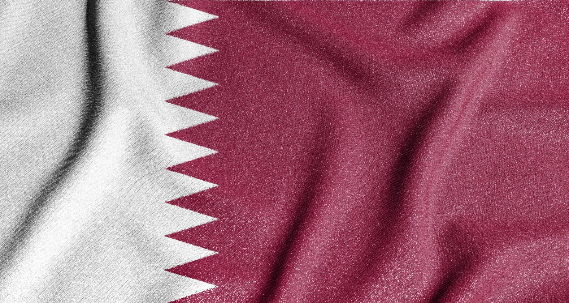 National flag of the Qatar. The main symbol of an independent country. Flag of Qatar. photo