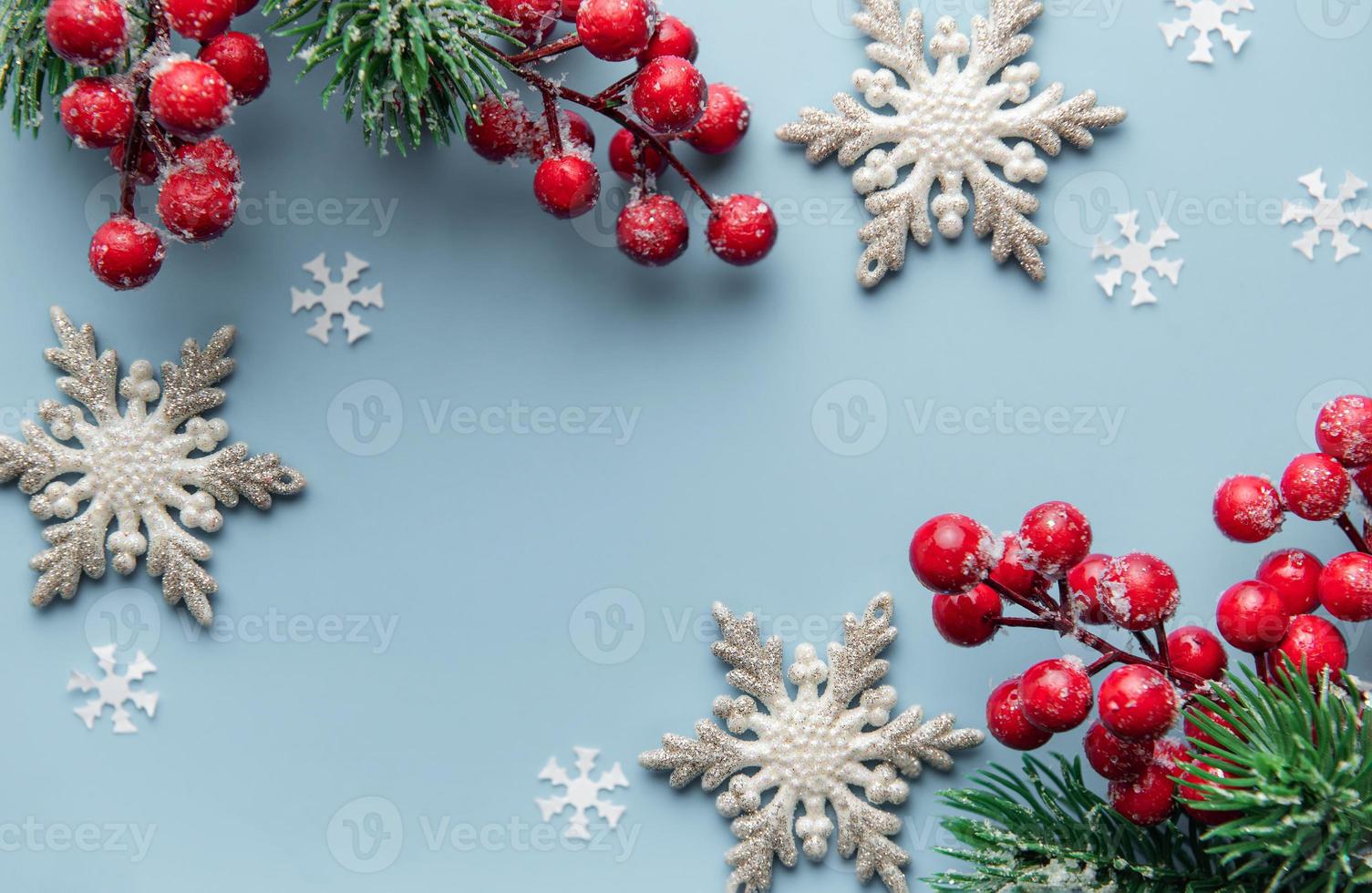 Fir Tree Decorations  On  Light Blue Background With  Copy Space photo